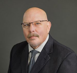 Mark Sprague Replacement Head Shot-300px
